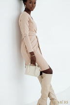 Luméri Muse | Envelope Dress With An Asymmetrical Bottom Beige 2 worn on model – LUMÉRI