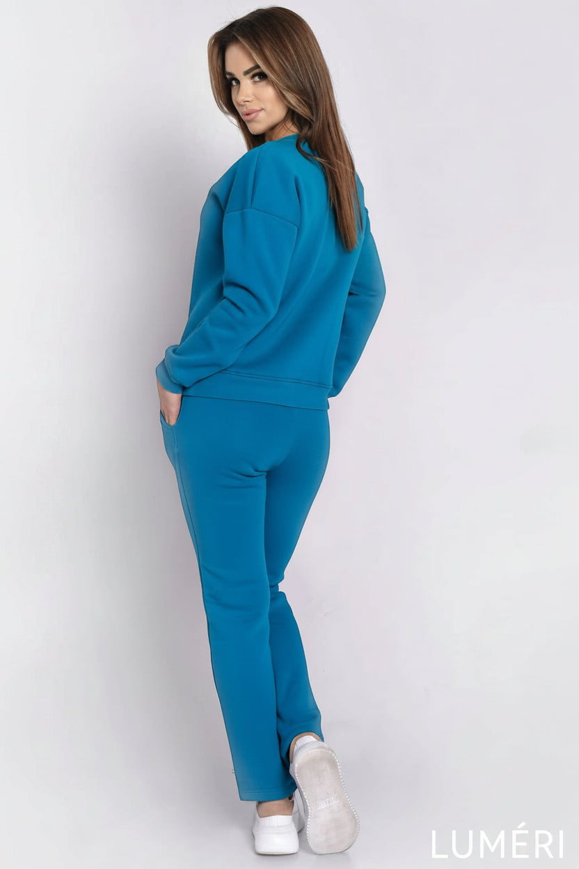 Luméri Leisure | Ladies Insulated Tracksuit Top And Loose Pants Turquoise 2 worn on model – LUMÉRI