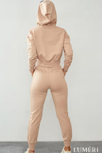 Luméri Leisure | Womens Tracksuit Set With An Asymmetric Sweatshirt Beige 2 worn on model – LUMÉRI