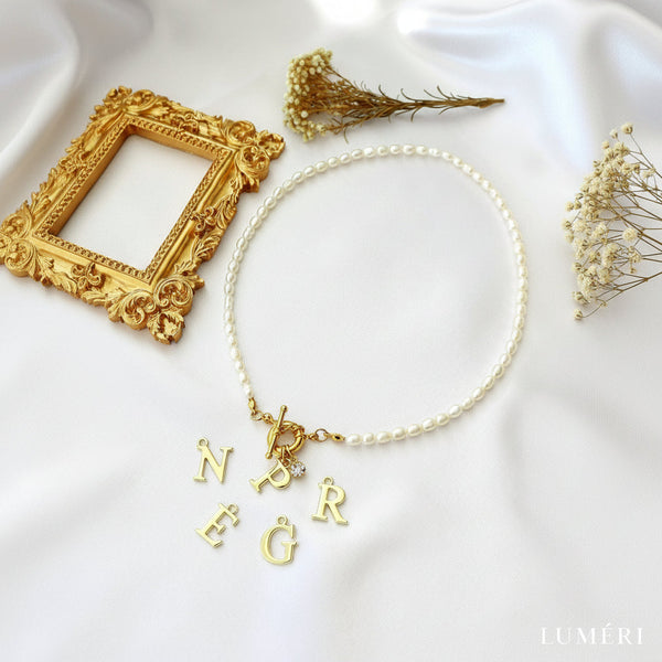 Luméri Aura | 24 Karats Custom Initial Freshwater Pearls Front Opening Choker product photo – LUMÉRI
