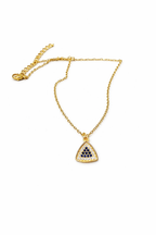 Luméri Solis | Stainless Steel Triangle Necklace worn on model – LUMÉRI
