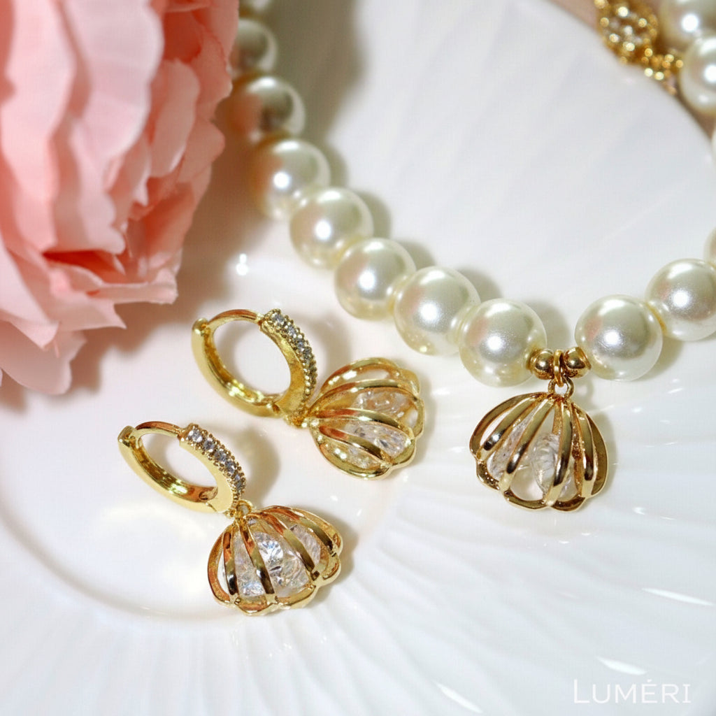 Luméri Bloom | 24 Karats Sea Shell Cubic Zirconia Hoops worn on model – LUMÉRI