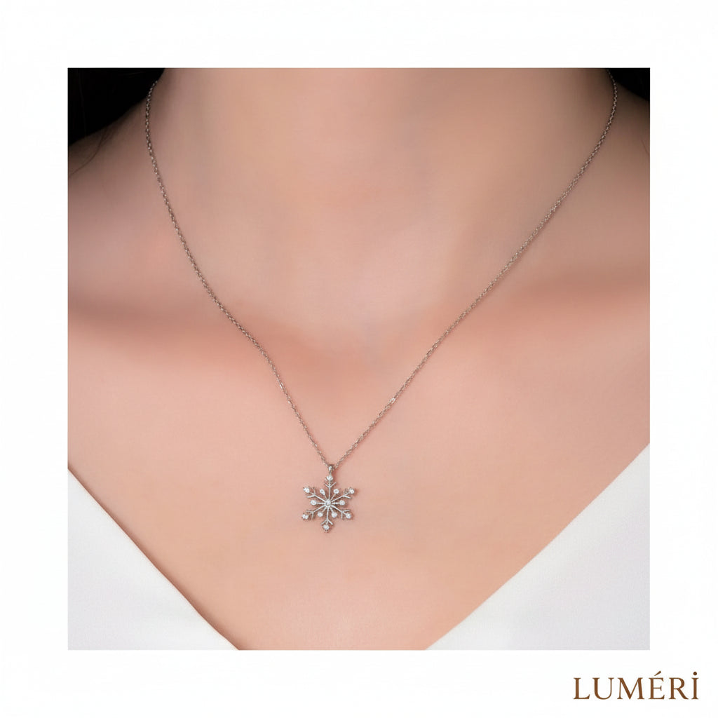 Luméri Bloom | 925 Sterling Silver Snowflake Necklace With White Stone worn on model – LUMÉRI