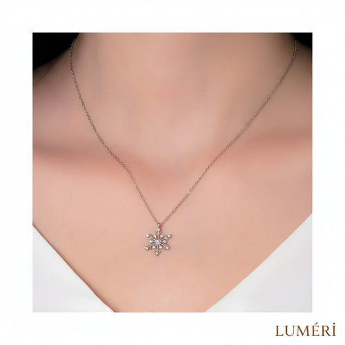 Luméri Bloom | 925 Sterling Silver Snowflake Necklace With White Stone worn on model – LUMÉRI