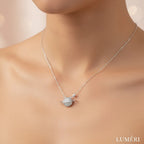 Luméri Bloom | 925 Sterling Silver Saturn Planet Necklace With White Zircon Stone close-up detail – LUMÉRI
