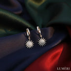 Luméri Aura | Silver Plated Sun Earrings With White Zircon Stone worn on model – LUMÉRI