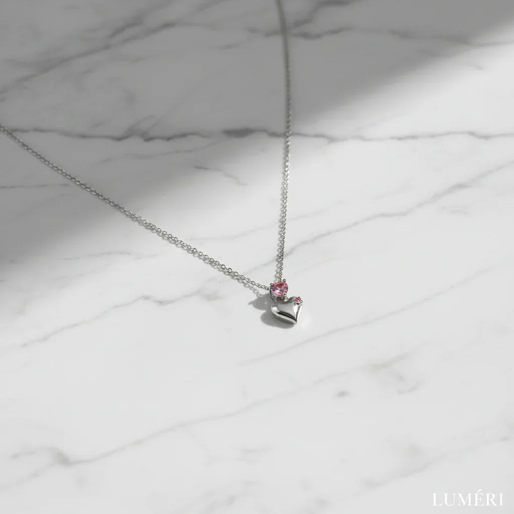 Luméri Bloom | Stainless Steel Pink Stone Heart Necklace For Women product photo – LUMÉRI