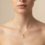 Luméri Bloom | 24 Karats Dainty Cannabis Leaf Necklace worn on model – LUMÉRI