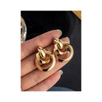 Luméri Solis | Luxury Gold Interlocking Circle Earrings Women Modern Chic Jewelry worn on model – LUMÉRI