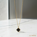 Luméri Bloom | Stainless Steel Black Clover Gold Necklace product photo – LUMÉRI