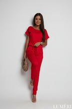 Luméri Studio | Red Jumpsuit With Bow 2 worn on model – LUMÉRI