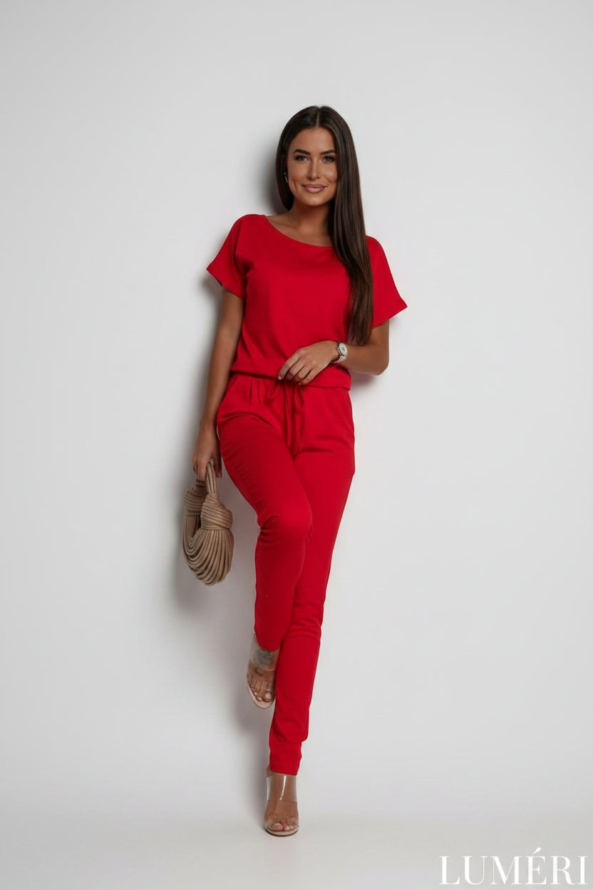 Luméri Studio | Red Jumpsuit With Bow 2 worn on model – LUMÉRI
