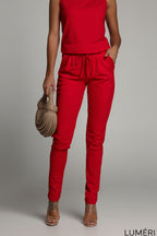 Luméri Studio | Red Jumpsuit With Bow 3 close-up detail – LUMÉRI